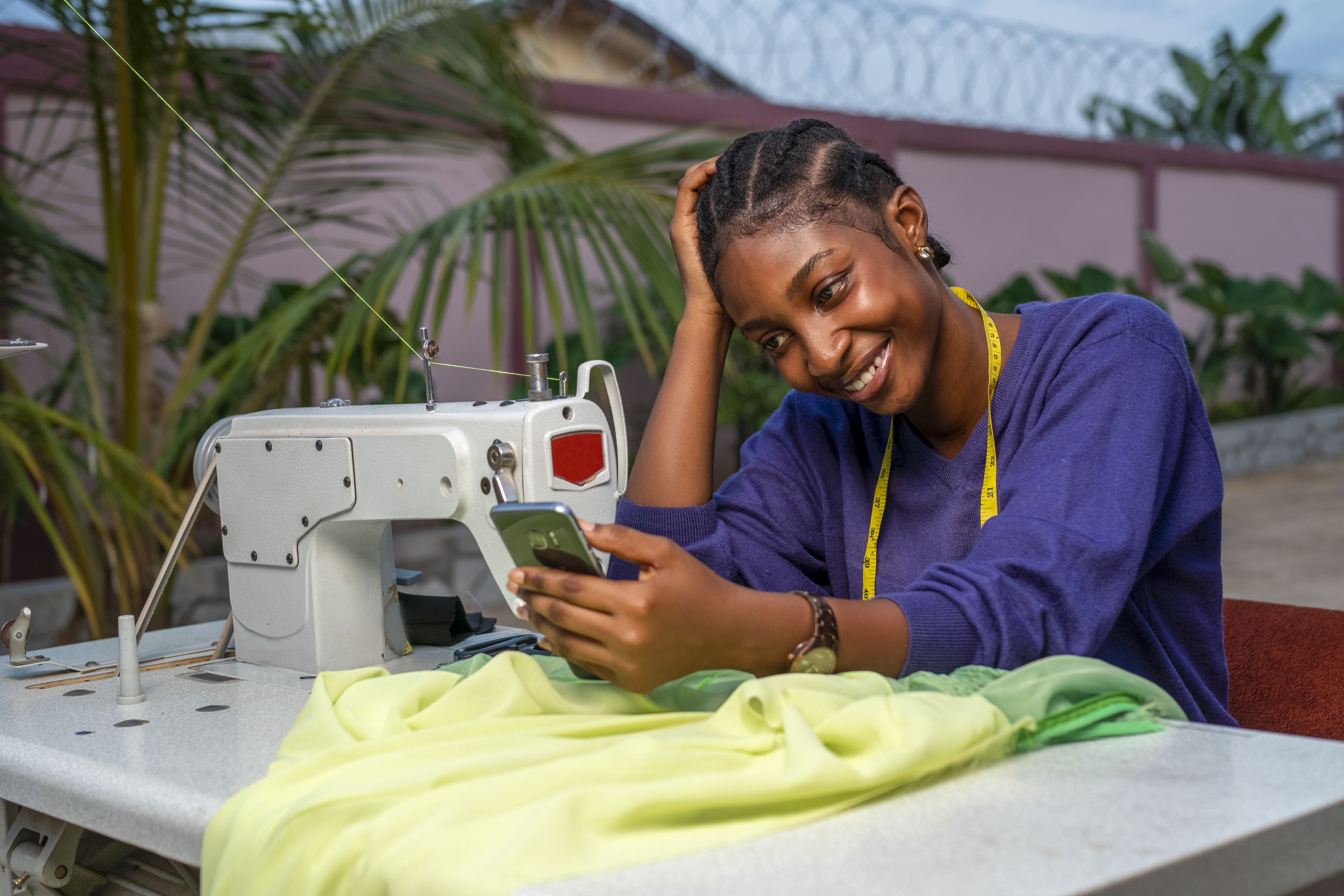 Customer receiving tailored clothes